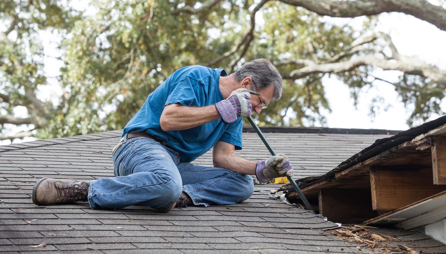 roofing contractor investigating the source of a leaking roof in san antonio tx