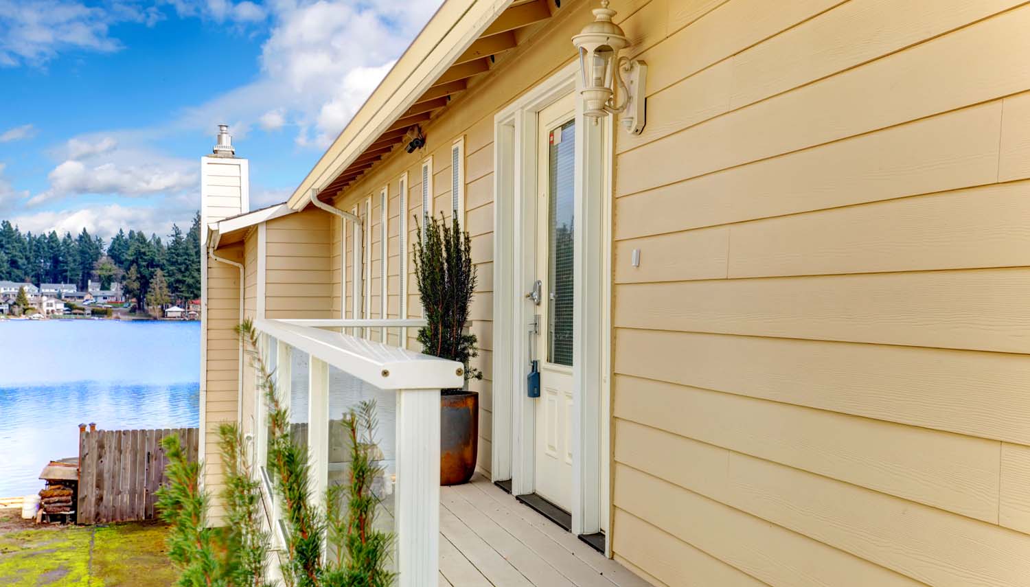 photo of a back deck showing the siding work of a vinyl siding contractor