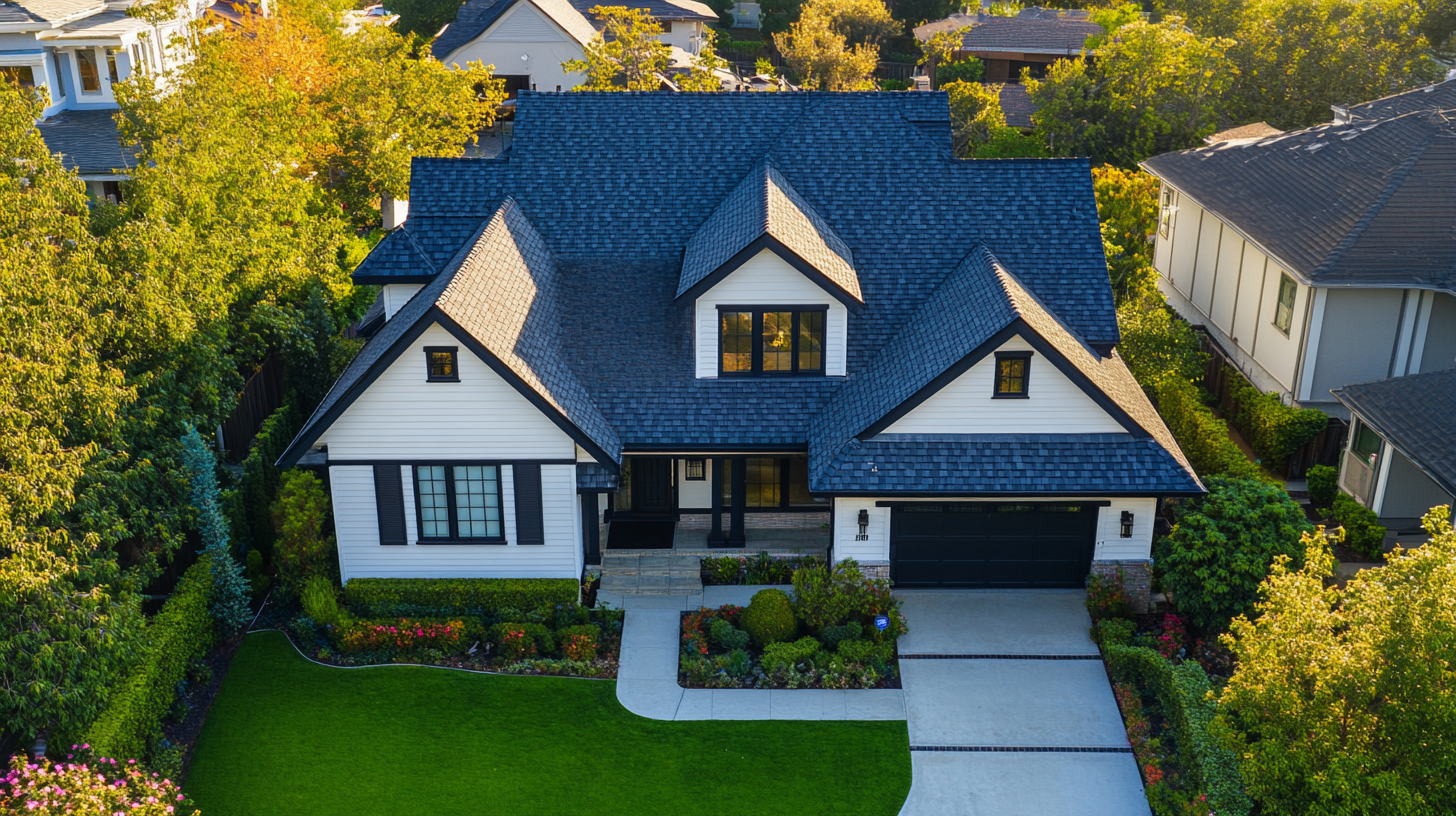 an image of a house with off-white painted walls and asphalt shingle roofs, emphasizing a 'cool roof' design